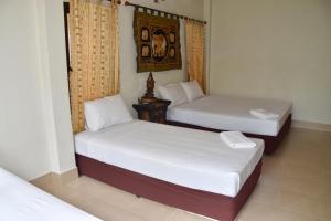 Кровать или кровати в номере Magic Resort