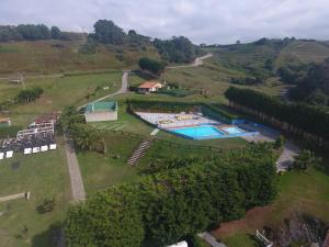 an aerial view of a resort with a swimming pool at Hotel Campomar in Isla