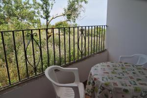 
A balcony or terrace at villa damecuta B&B
