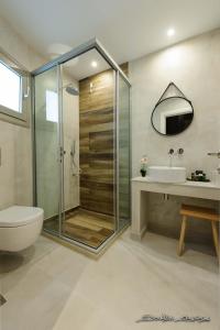 Koupelna v ubytování Alfa Hotel