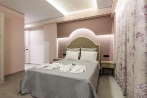 Voodi või voodid majutusasutuse Artemis Apartments toas