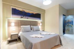 Voodi või voodid majutusasutuse Artemis Apartments toas