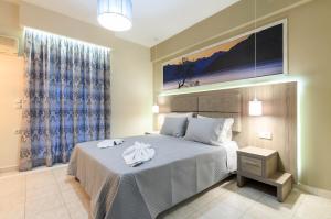 Voodi või voodid majutusasutuse Artemis Apartments toas