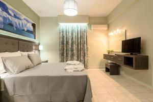 Voodi või voodid majutusasutuse Artemis Apartments toas