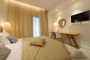 Postel nebo postele na pokoji v ubytování Alfa Hotel