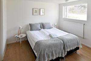 Postel nebo postele na pokoji v ubytování Natura Apartments