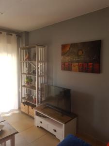 TV a/nebo společenská místnost v ubytování Sunset Tarifa