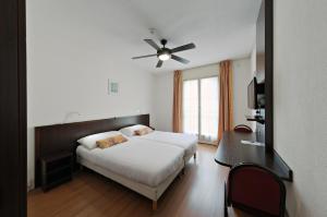 Letto o letti in una camera di Calvy