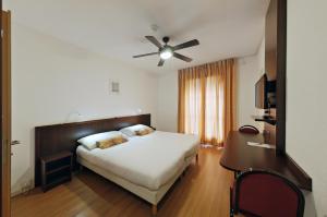 Letto o letti in una camera di Calvy