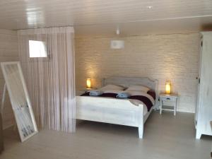 Postel nebo postele na pokoji v ubytování bnb Valais - by La Sittelle