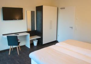 Postel nebo postele na pokoji v ubytování Hof Hahnenberg