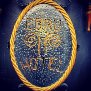 Palkinto, sertifikaatti, kyltti tai muu asiakirja, joka on esillä majoituspaikassa Hotel Ebru Antique