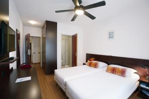 Letto o letti in una camera di Calvy