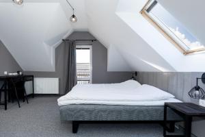Łóżko lub łóżka w pokoju w obiekcie Pensjonat Kocius