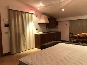 Afbeelding uit fotogalerij van La Poderina Appartamenti in Castelnuovo dellʼAbate