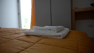 Postel nebo postele na pokoji v ubytování Hotel Ionian