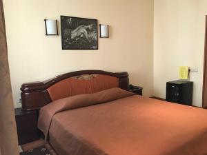 Кровать или кровати в номере Гостиница Крон