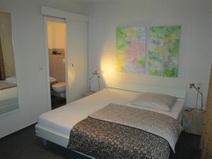 Ein Bett oder Betten in einem Zimmer der Unterkunft Hotel Schlafschön