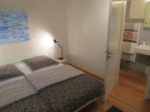Ein Bett oder Betten in einem Zimmer der Unterkunft Hotel Schlafschön