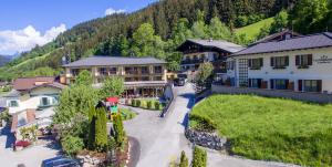 an aerial view of a resort in the mountains at Landhotel Laudersbach in Altenmarkt im Pongau