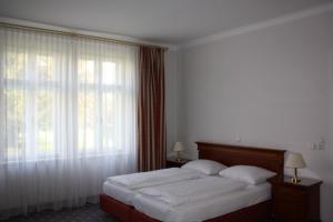 Letto o letti in una camera di Parkhotel Styria