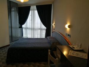 Postel nebo postele na pokoji v ubytování Hotel Meripol