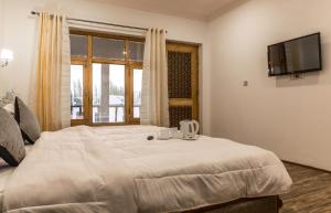Letto o letti in una camera di Ree Hostel