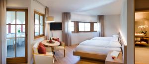 Postel nebo postele na pokoji v ubytování Hotel Spitaler