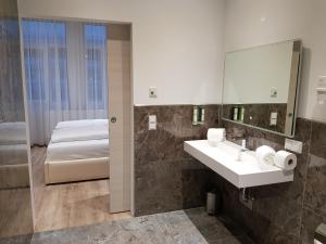 Koupelna v ubytování RheinCity Hotel & Boardinghouse