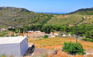 a view of a mountain from a house at Margarita Hotel in Kythira
