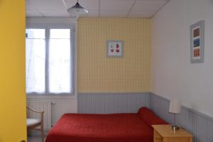 Postel nebo postele na pokoji v ubytování Hotel Chez Benat