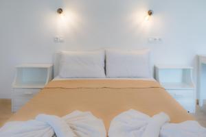 Postel nebo postele na pokoji v ubytování Stellar Apartments I