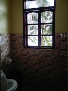 Et badeværelse på Coconut Garden Island Resort