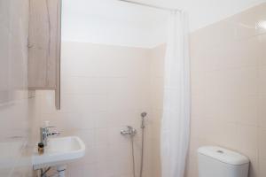 Koupelna v ubytování Stellar Apartments I