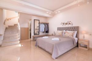 A bed or beds in a room at Villa Sunset