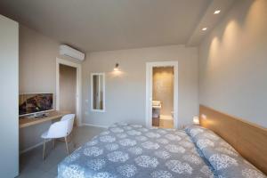 Domu Simius Life Style Hotel客房内的一张或多张床位