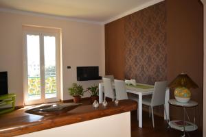 Televízia a/alebo spoločenská miestnosť v ubytovaní ilGirasole b&b