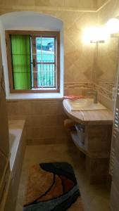 Kylpyhuone majoituspaikassa Weinzettl