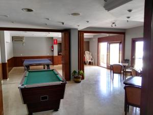 a billiard room with a pool table in it at APARTAMENT MAGNIFIQUES VISTES- PORT DE REI in L'Escala