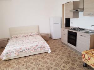 Kuchyň nebo kuchyňský kout v ubytování Sea Salento Casa Vacanze