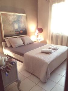 Postel nebo postele na pokoji v ubytování Casa del mare