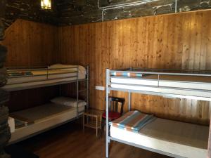 Двухъярусная кровать или двухъярусные кровати в номере Albergue San Lázaro