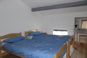Postel nebo postele na pokoji v ubytování gite les rouets