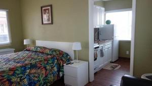 Postel nebo postele na pokoji v ubytování Ocean Drive Villas