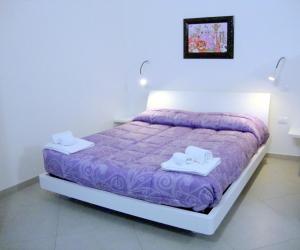 Postel nebo postele na pokoji v ubytování Iride Guest House
