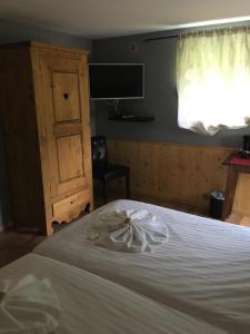 Postel nebo postele na pokoji v ubytování Hotel Elisabeth