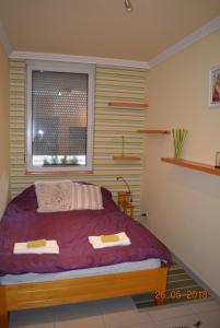 Posteľ alebo postele v izbe v ubytovaní Berettyo Central Apartment + 12 fotografií
