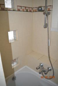 Kúpeľňa v ubytovaní Berettyo Central Apartment