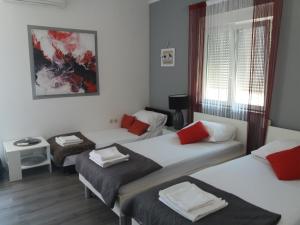 Posteľ alebo postele v izbe v ubytovaní Apartments Benic + 37 fotografií
