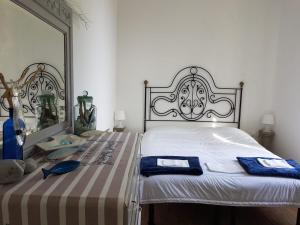 Postel nebo postele na pokoji v ubytování B&B Casa Del Priore